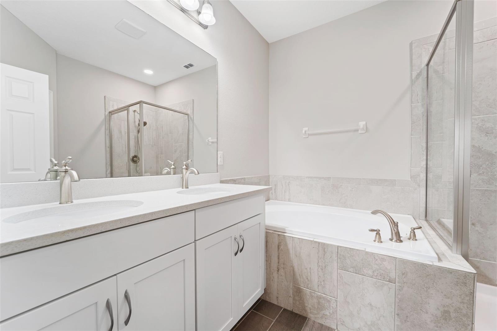 Primary ensuite with shower & soaking tub