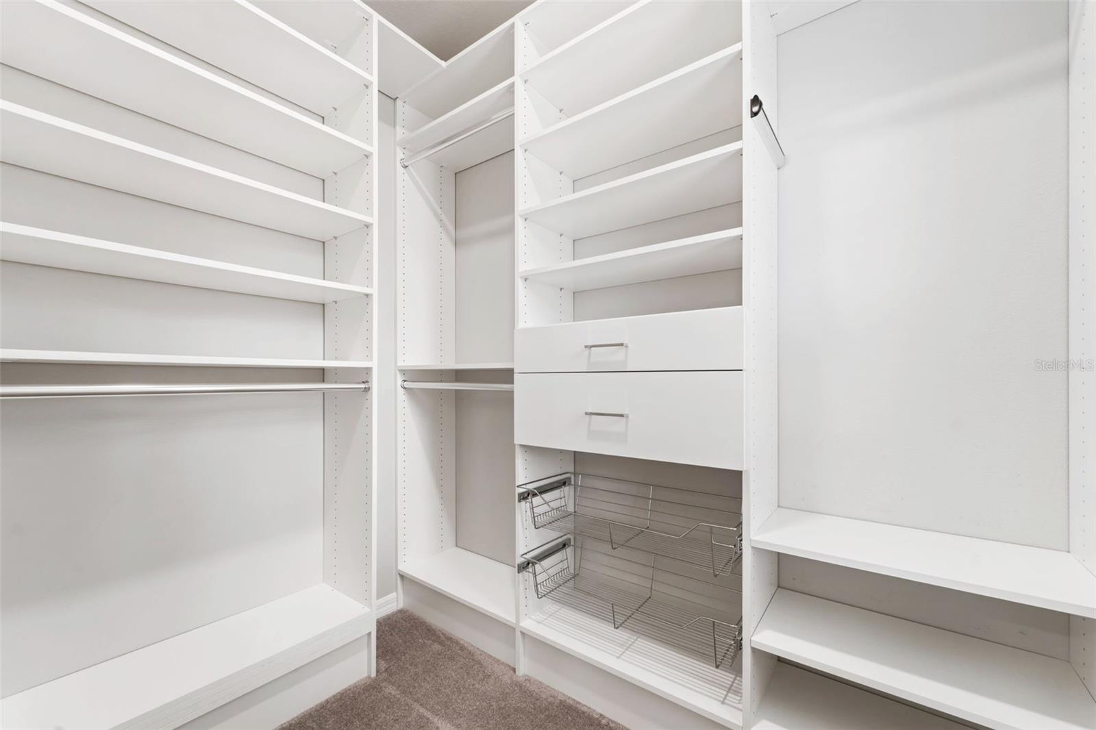 Primary walk-in custom closet