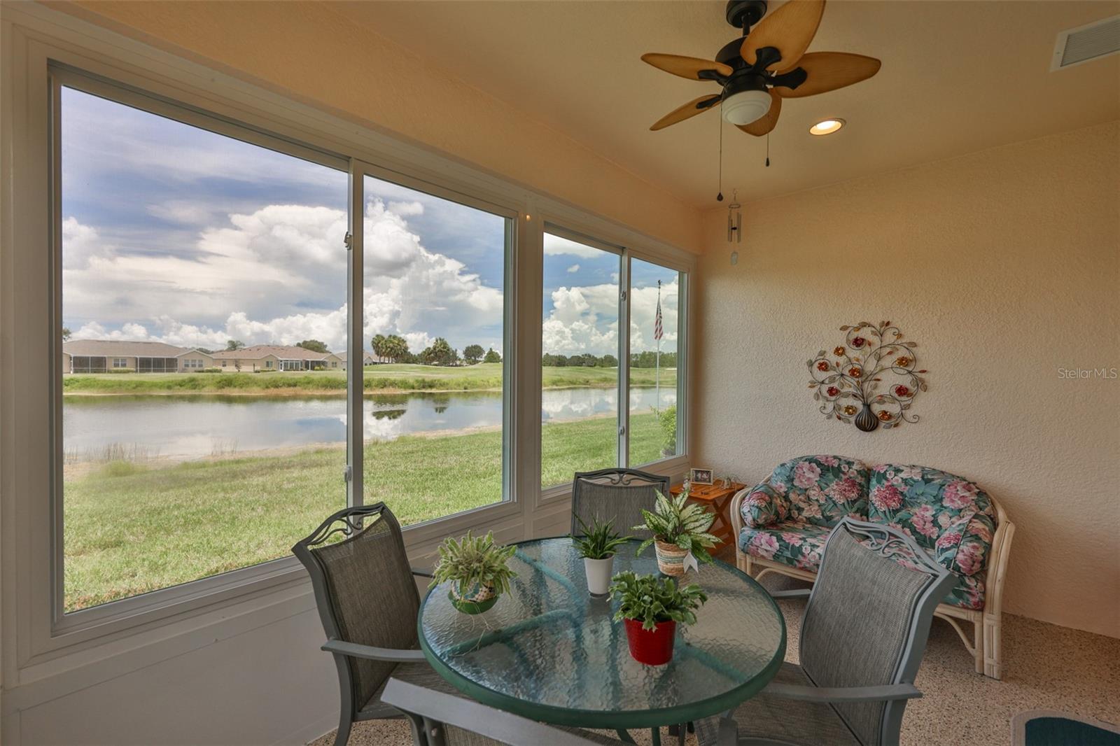 Your private waterfront home, Florida Room, sliders and room to lounge and entertainment, ceiling fan, air conditioned / heated for your 365 day comfort!