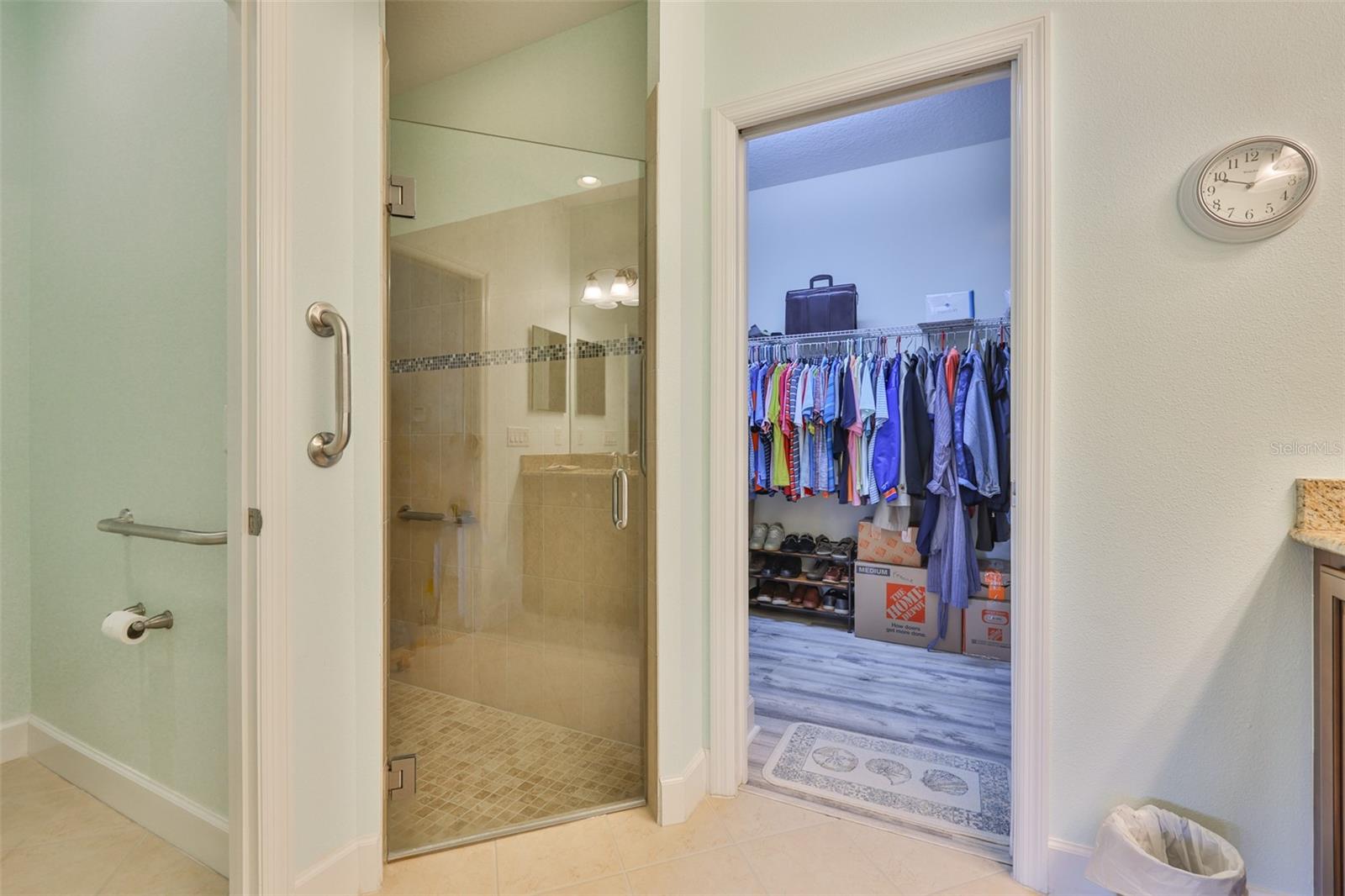 Primary Bath, stall shower, grab bars, large walk-in closet