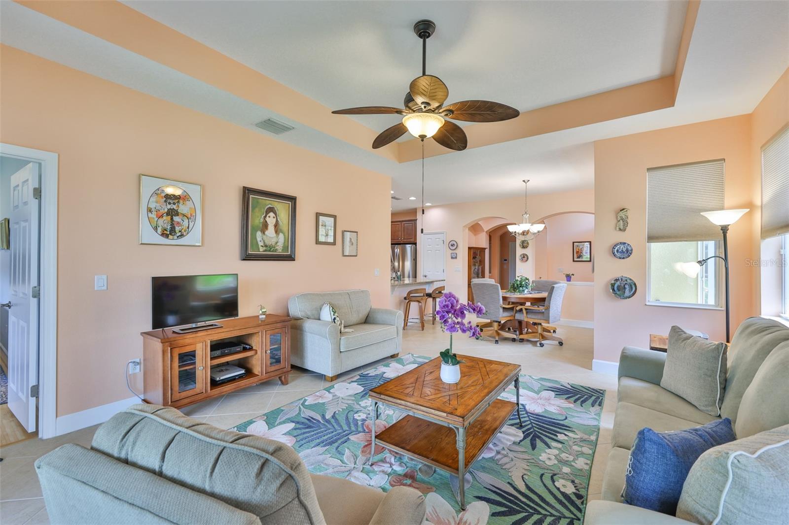 Great Room, Primary bedroom on left, looking to Dining Room, Chef's Kitchen and Foyer