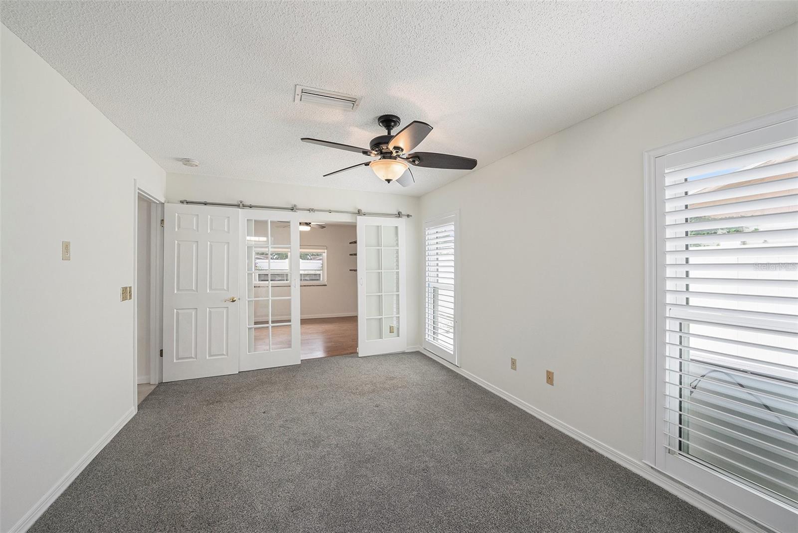 French doors seperate a home office, nursery or even a 4th bedroom!