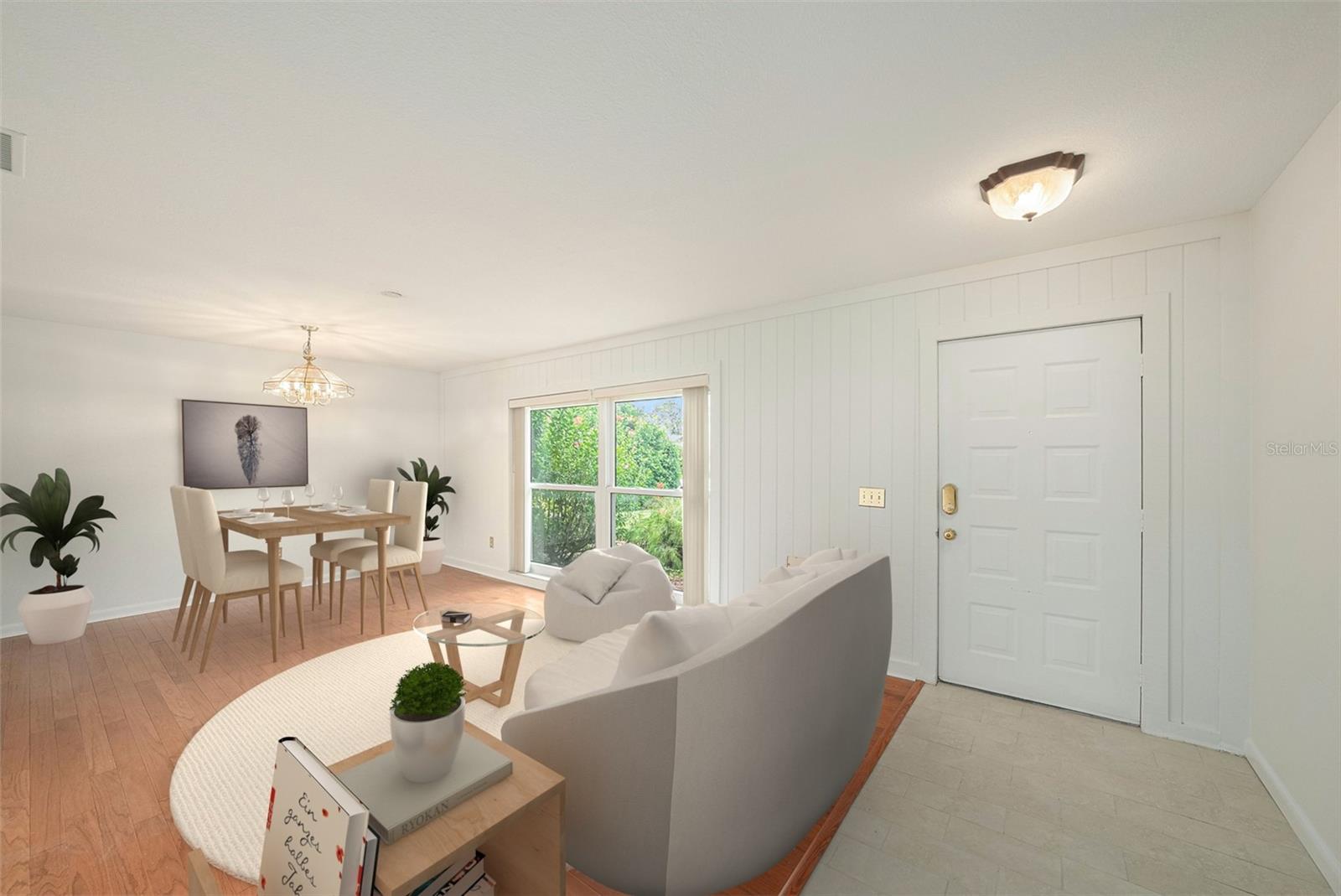 Living & dining room combo enjoys tons of natural light!
