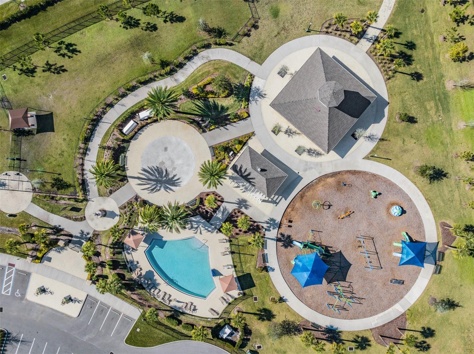Secondary Pool Area with shaded picnic tables, playground, dog park and plenty of outdoor space