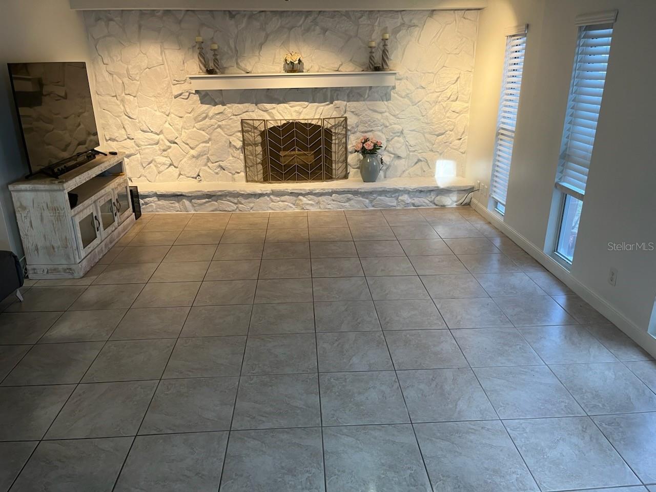 Living Room with working Wood Burning Fireplace