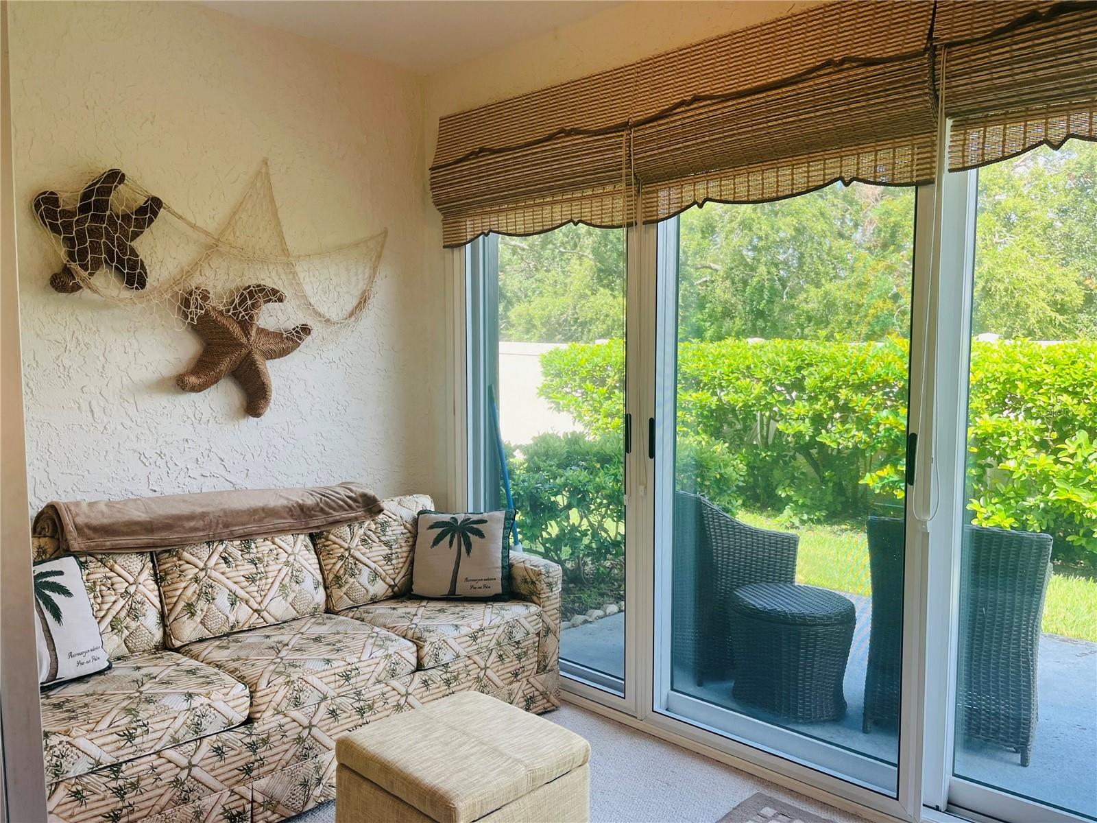 Triple Hurricane Sliders with Gorgeous wicker blinds!