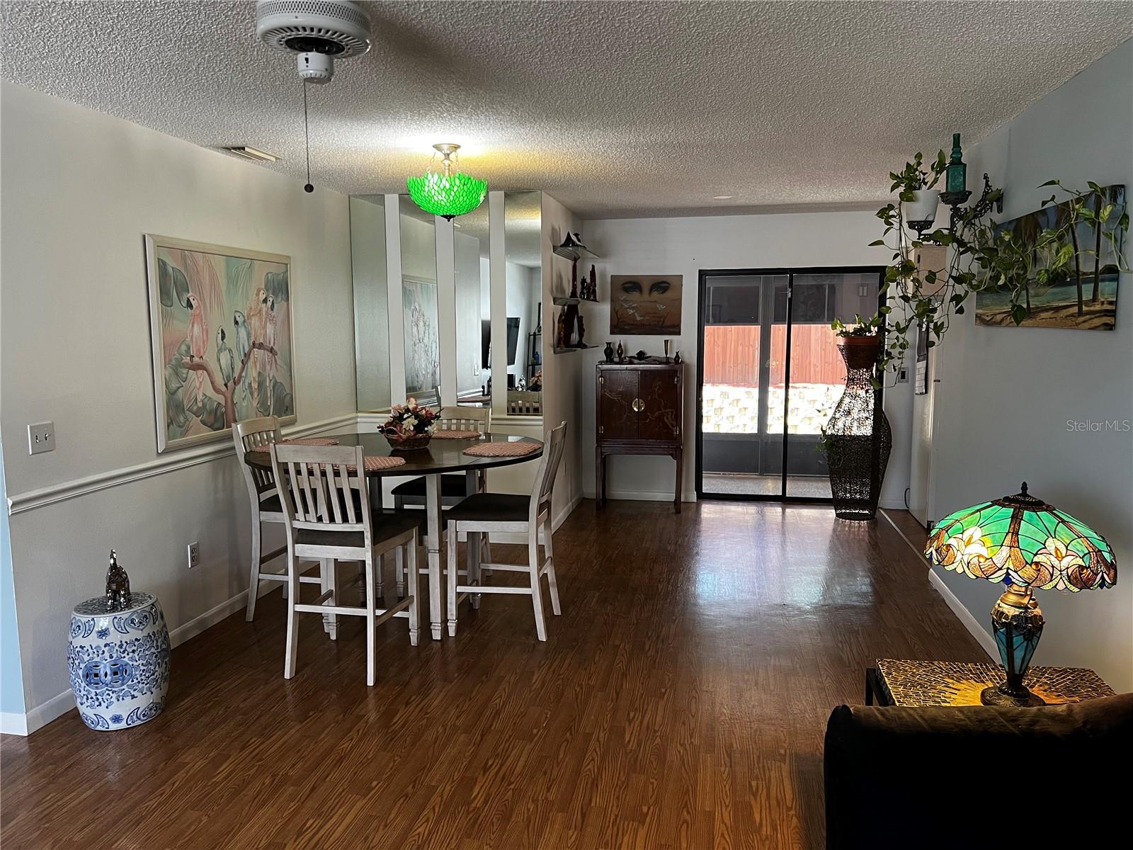 Dining Area and areafor a desk just beyond before sliding door to Back Porch