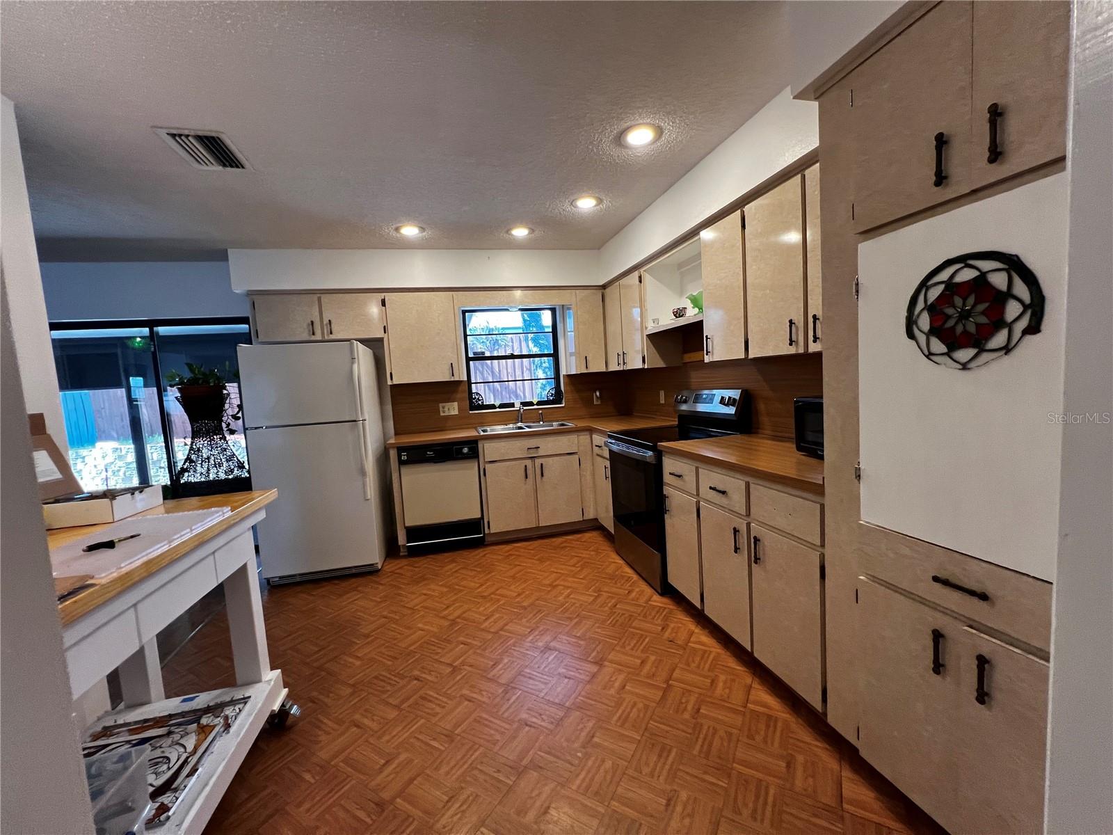 View of Kitchen from Entry to Garage
