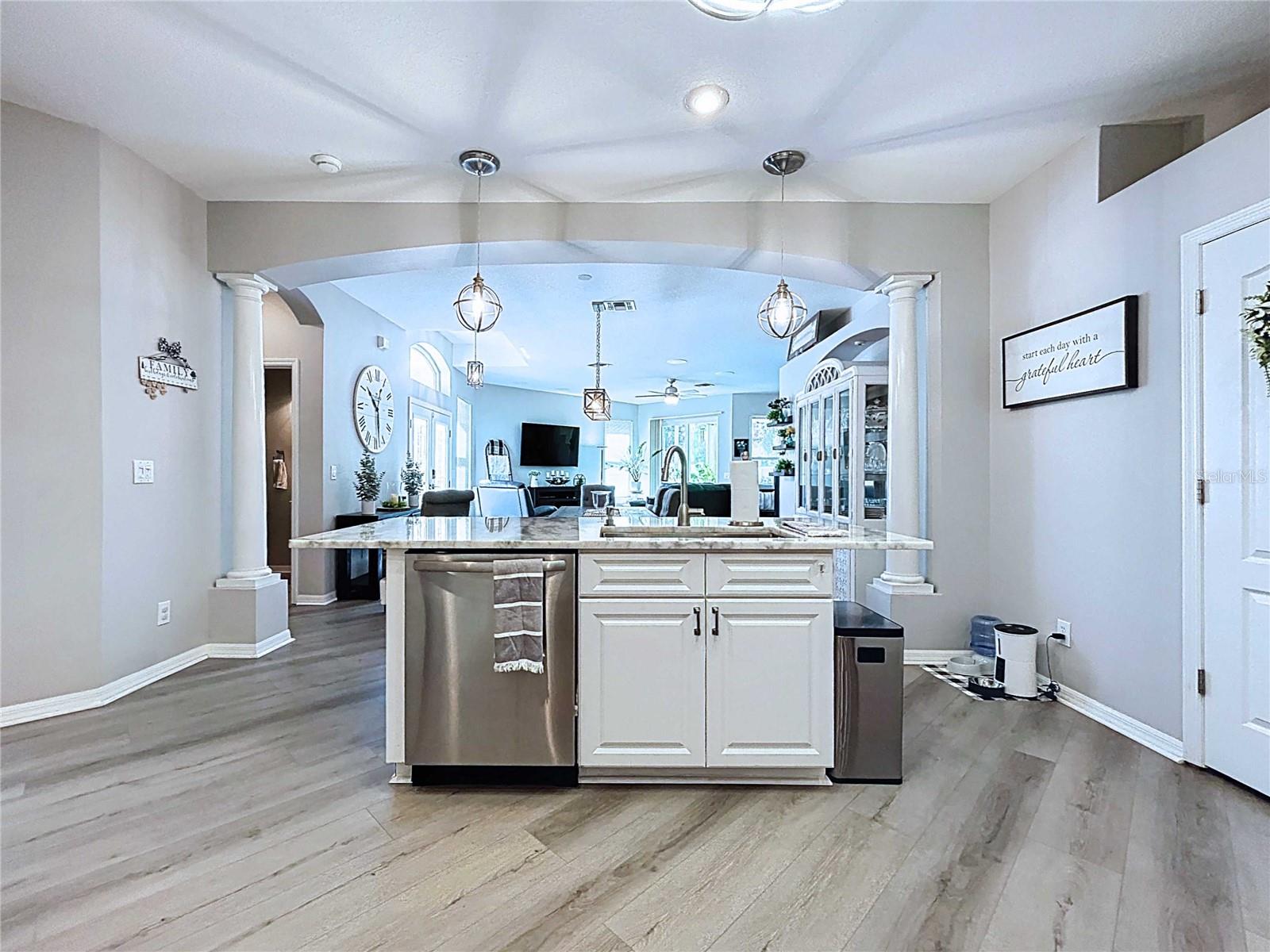 Kitchen island featuring LVP flooring