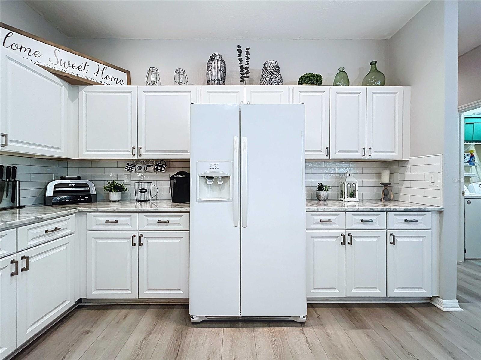 Kitchen featuring quartzite counters