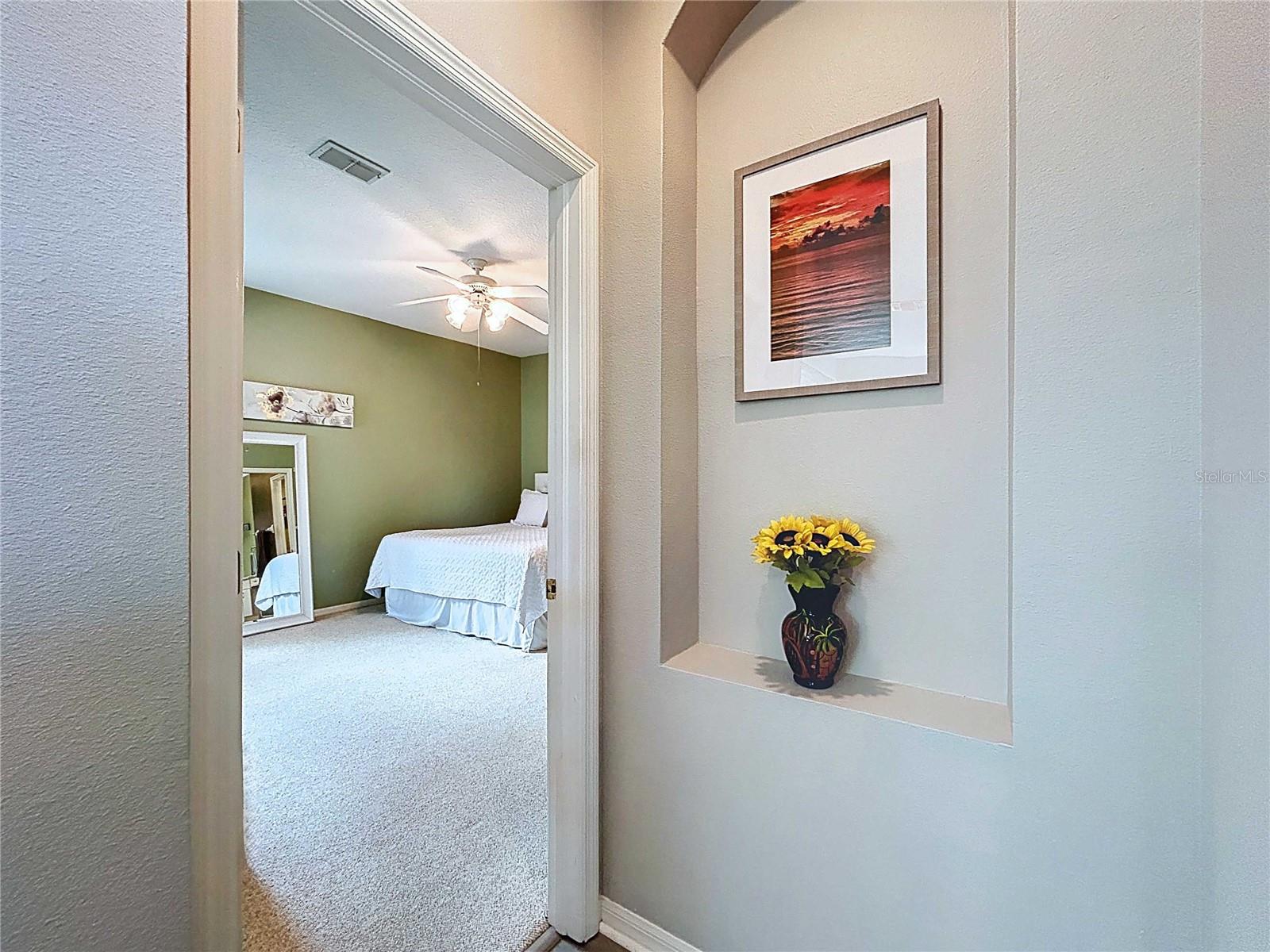 Niche by primary bedroom entrance