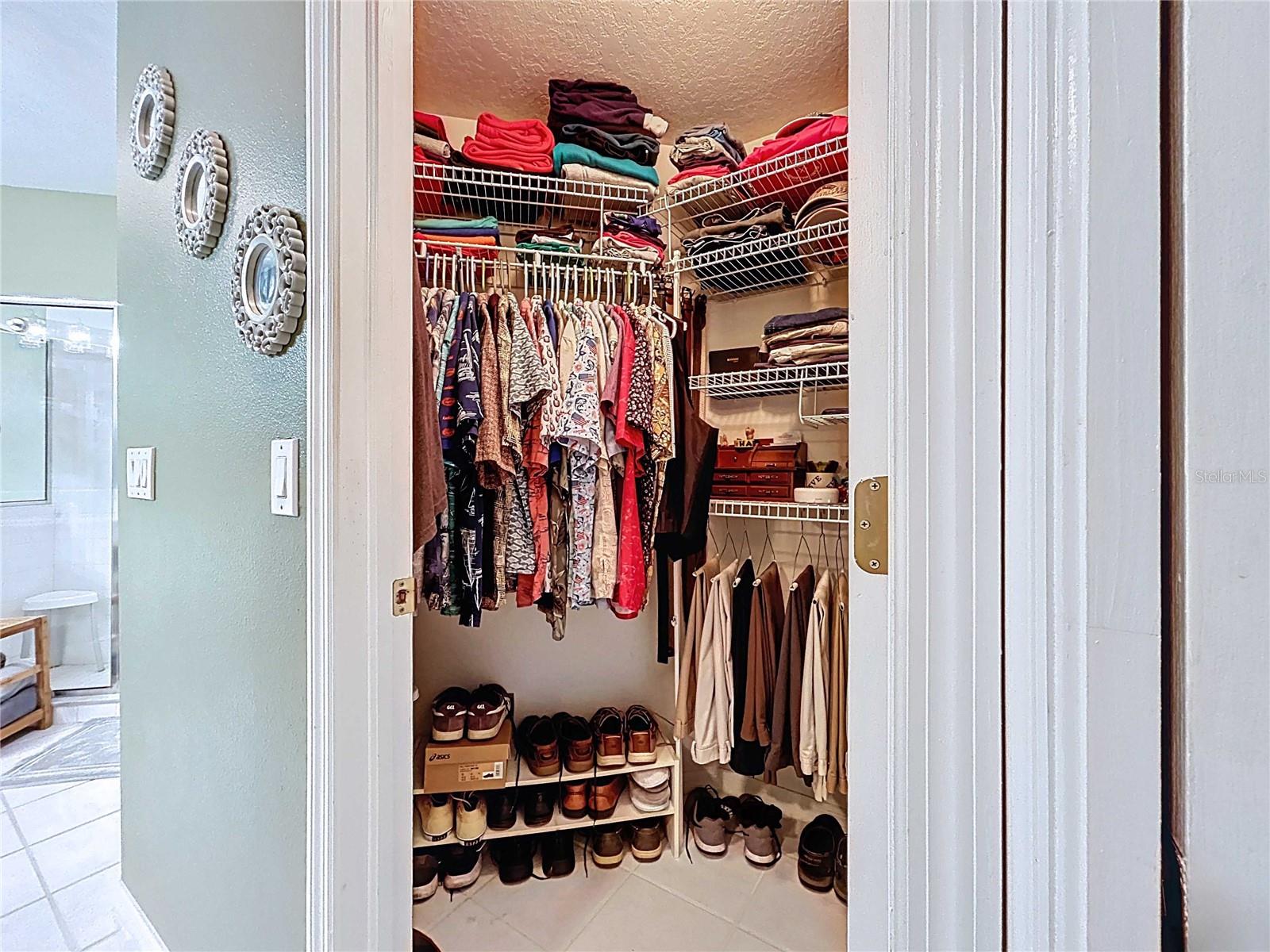 One of two primary bedroom closets