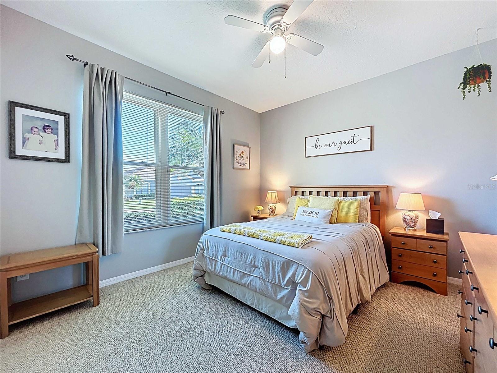 Bedroom #2 featuring berber carpet