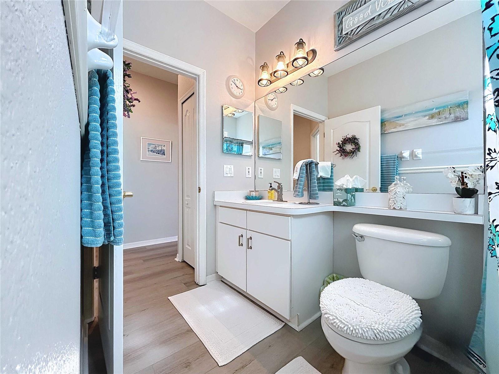Full bath #2 featuring LVP flooring