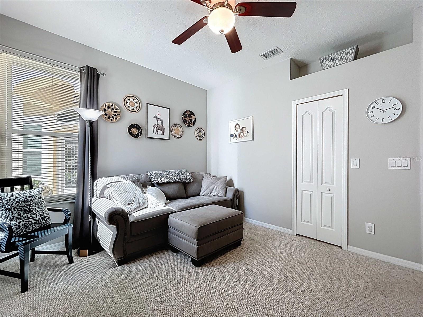 Bedroom #3 featuring berber carpet