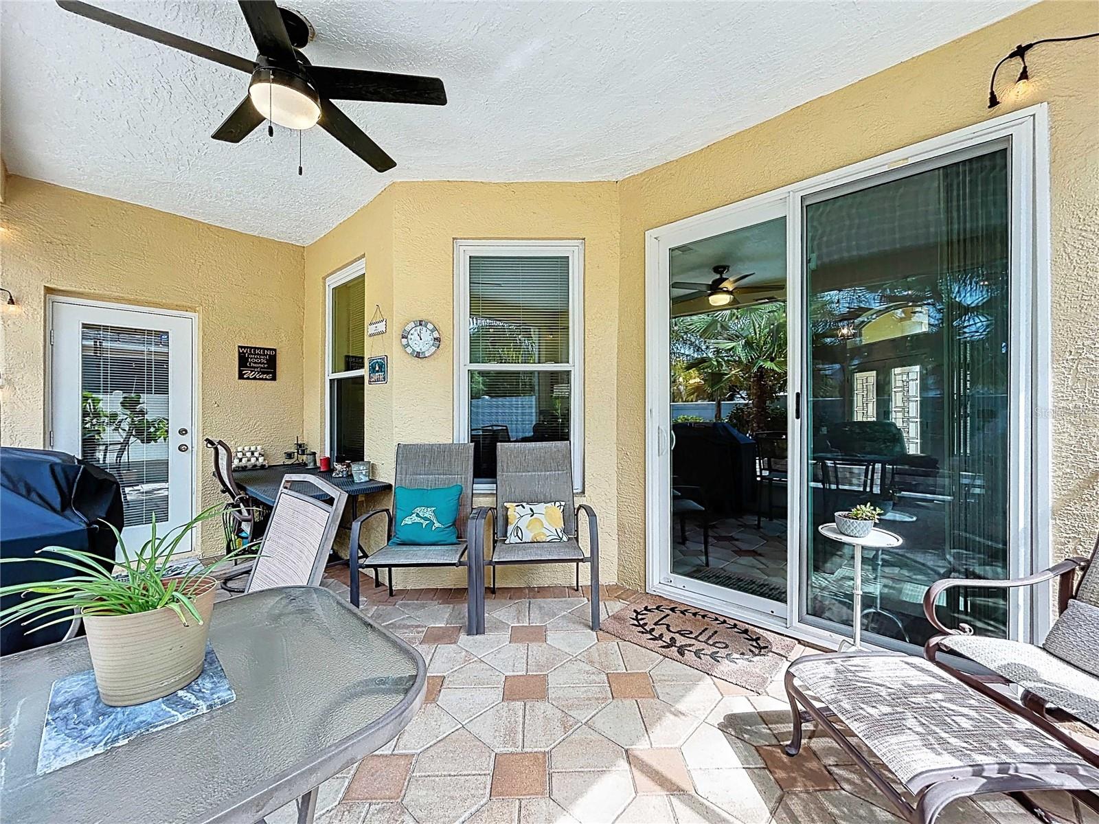 Screened-in covered lanai with heavy duty slider locking mechanism