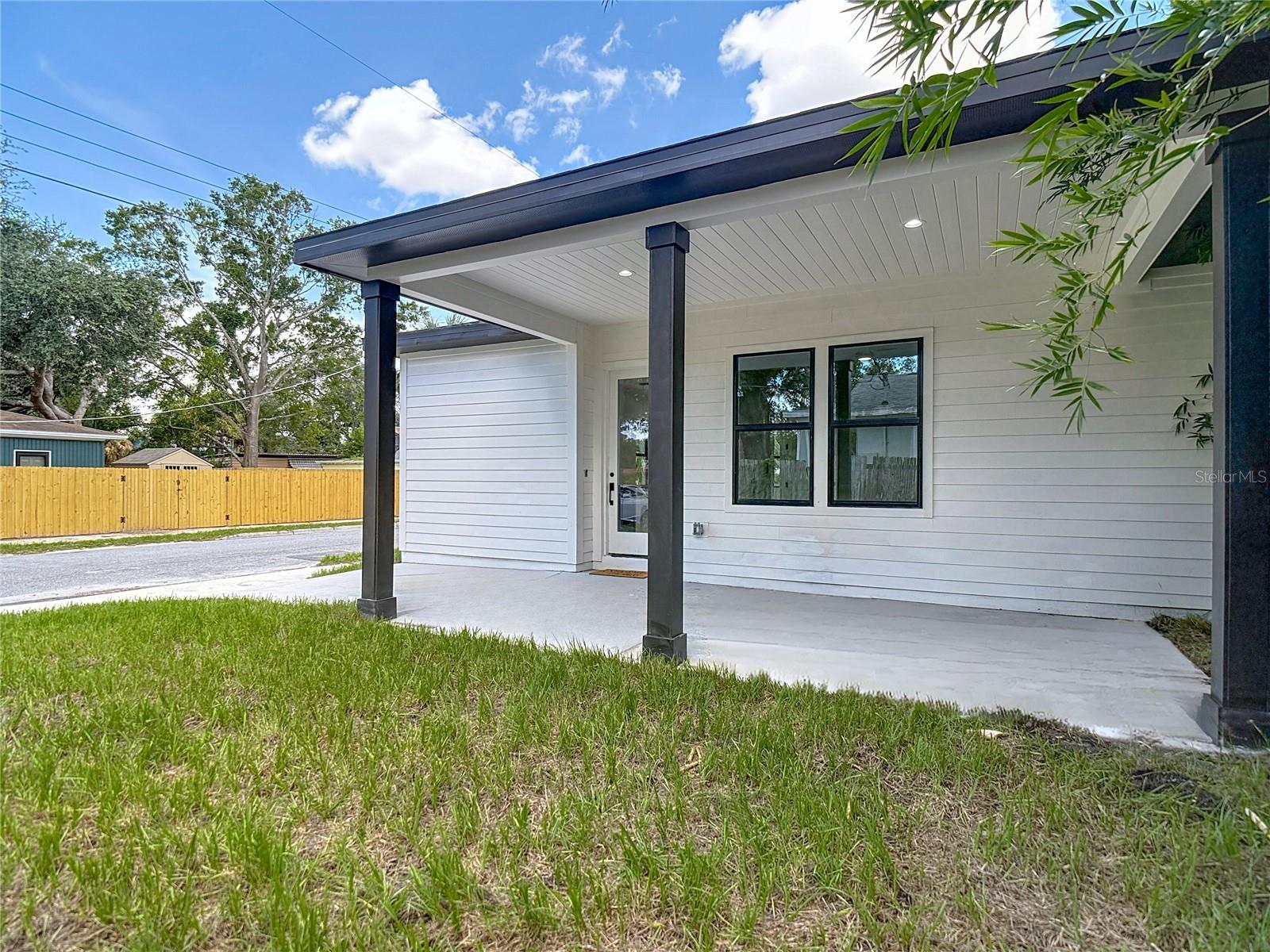 Carport/ Covered Patio (rear of home)