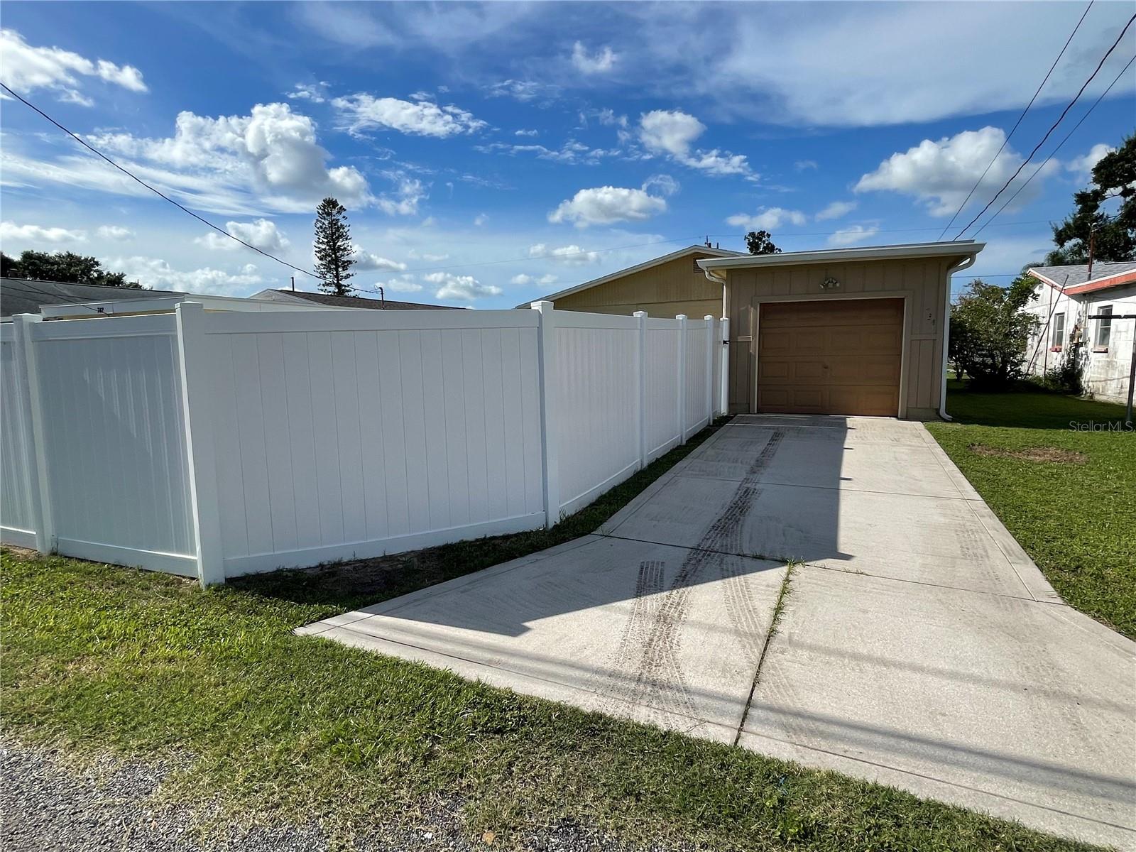 NEWER CONCRETE DRIVEWAY * NEW FENCE