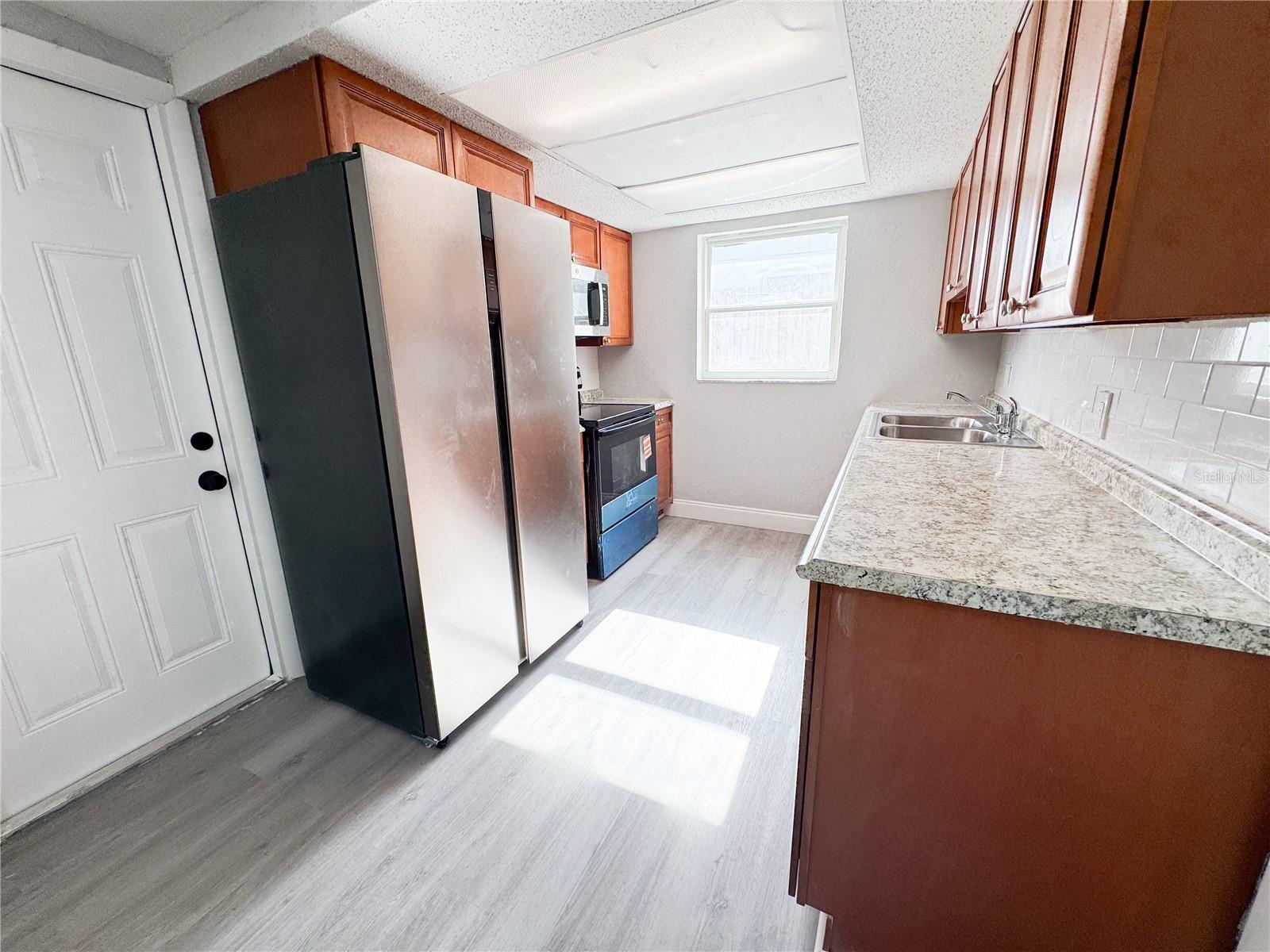 Kitchen w/ brand new Stainless Steel Appliances