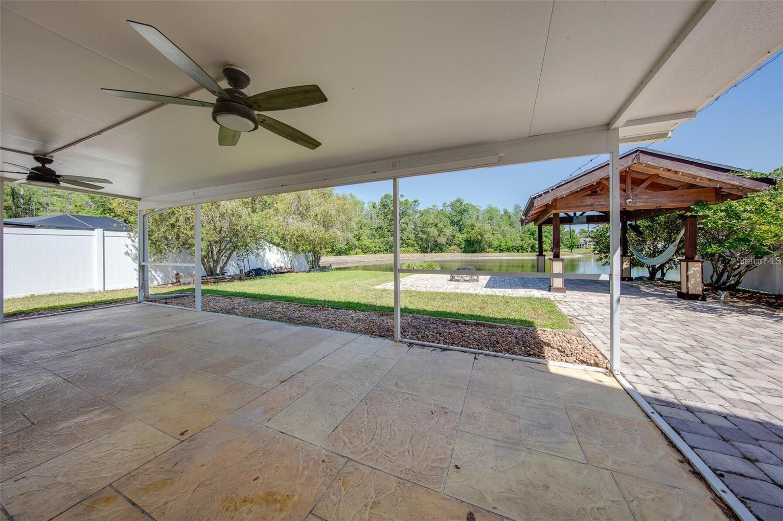 Covered patio at rear of home!