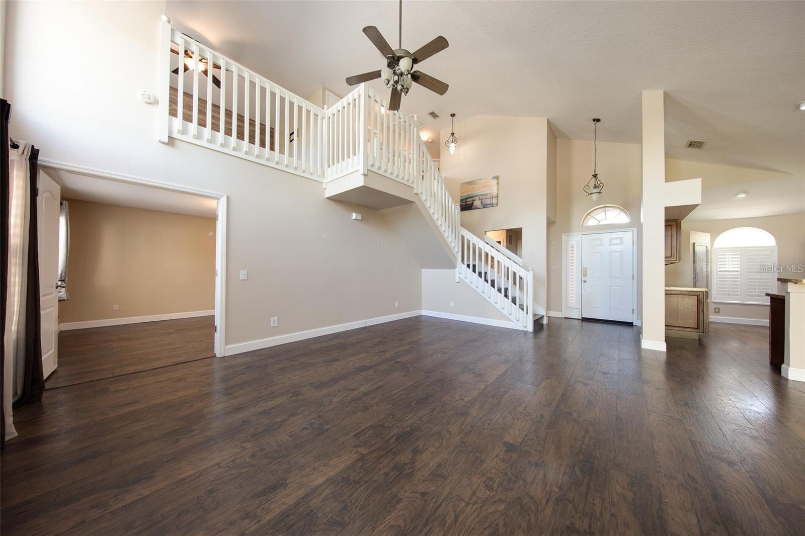 Gorgeous staircase leading to the upstairs!