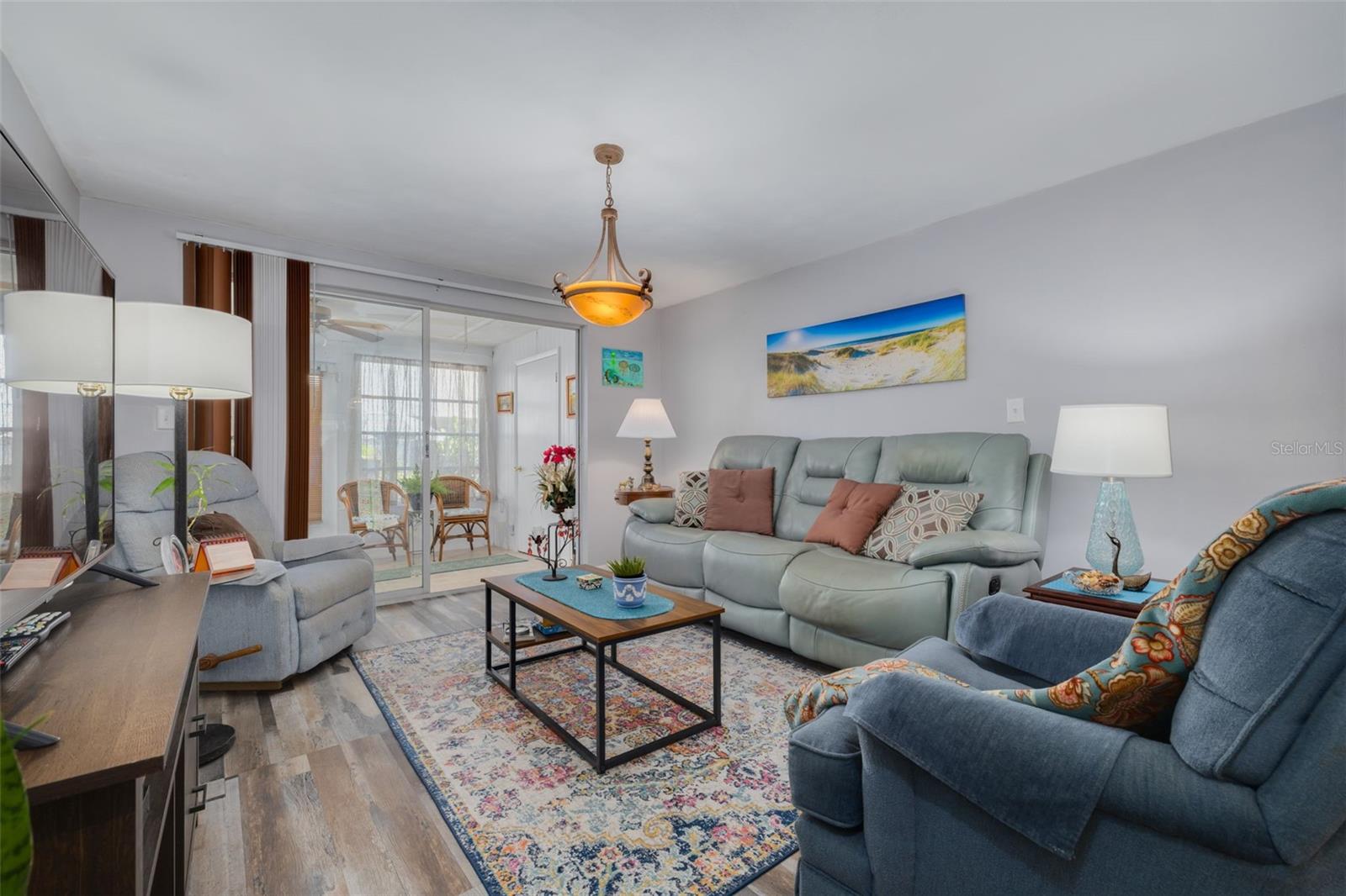 Living Room view with Sun Parlor entry.