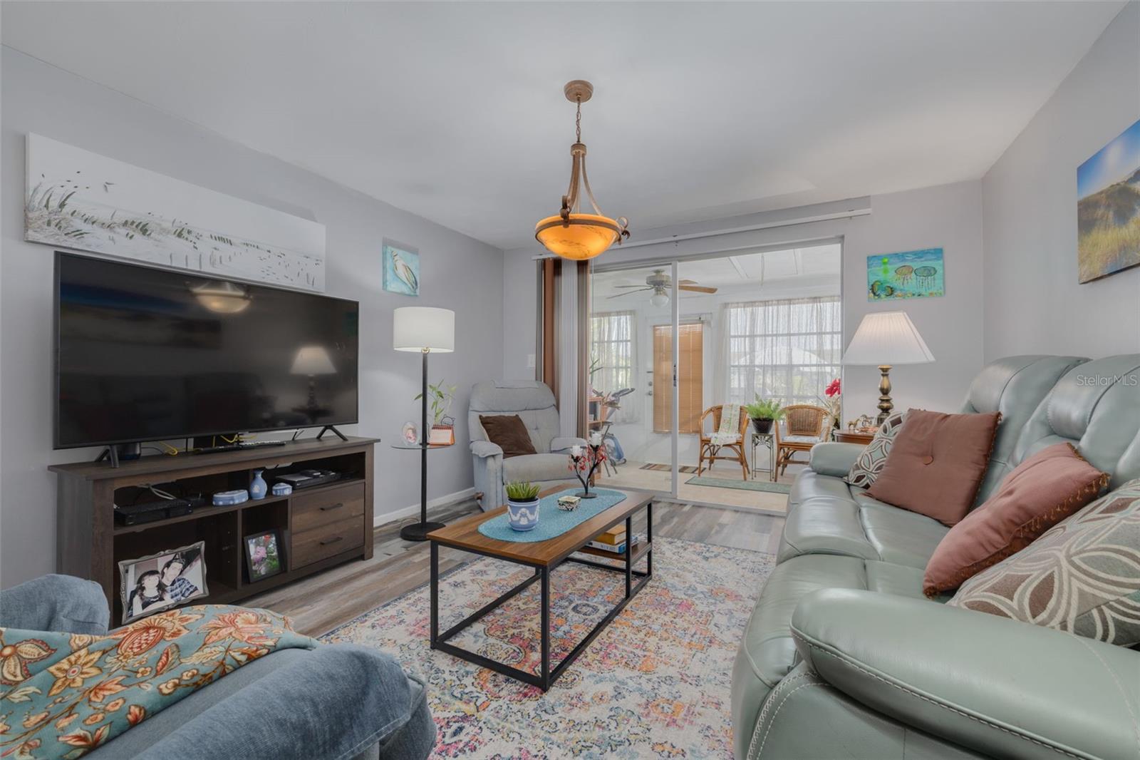 Spacious Living Room with all Natural Light.