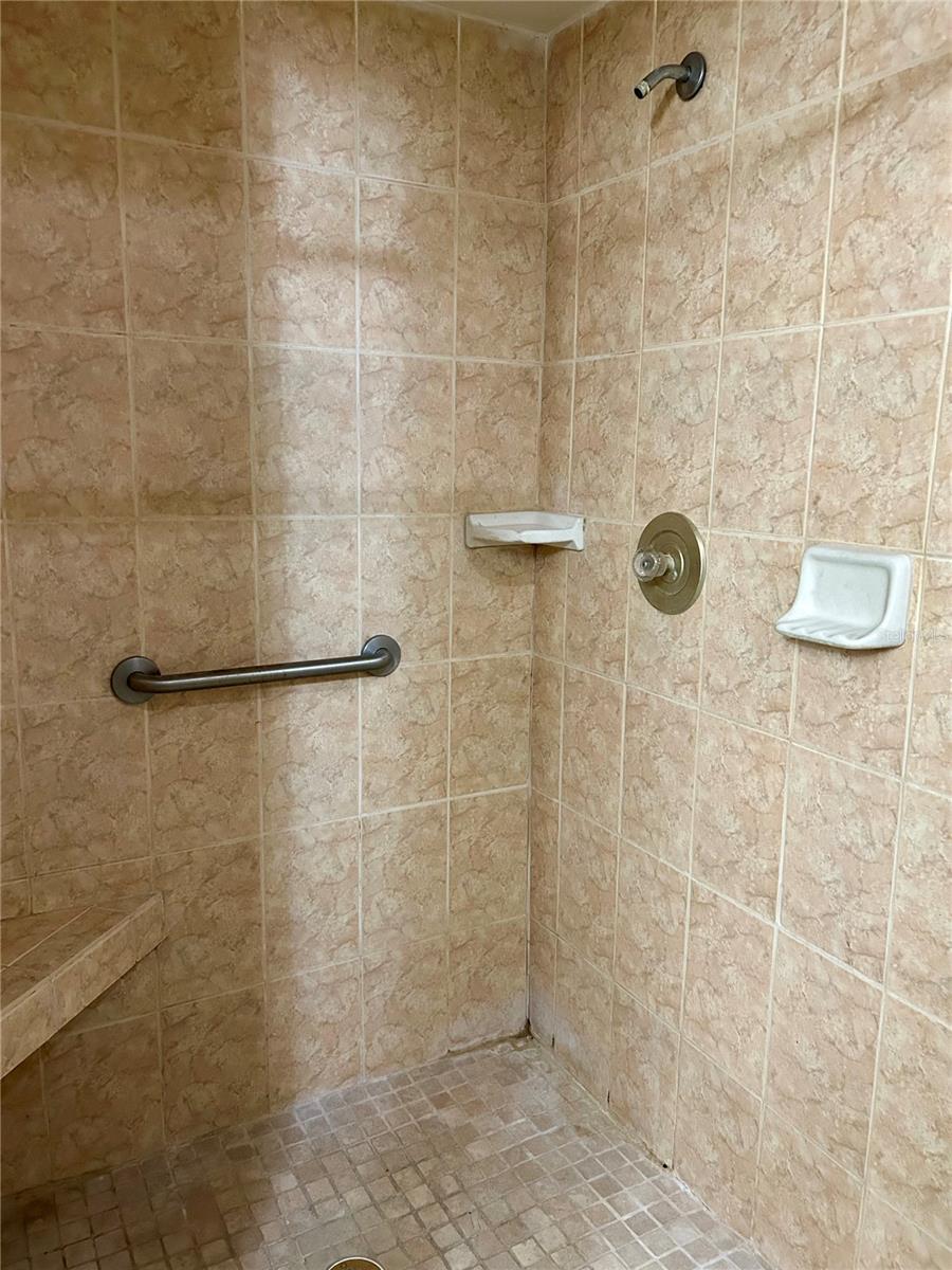 Primary walk in shower, newer tile