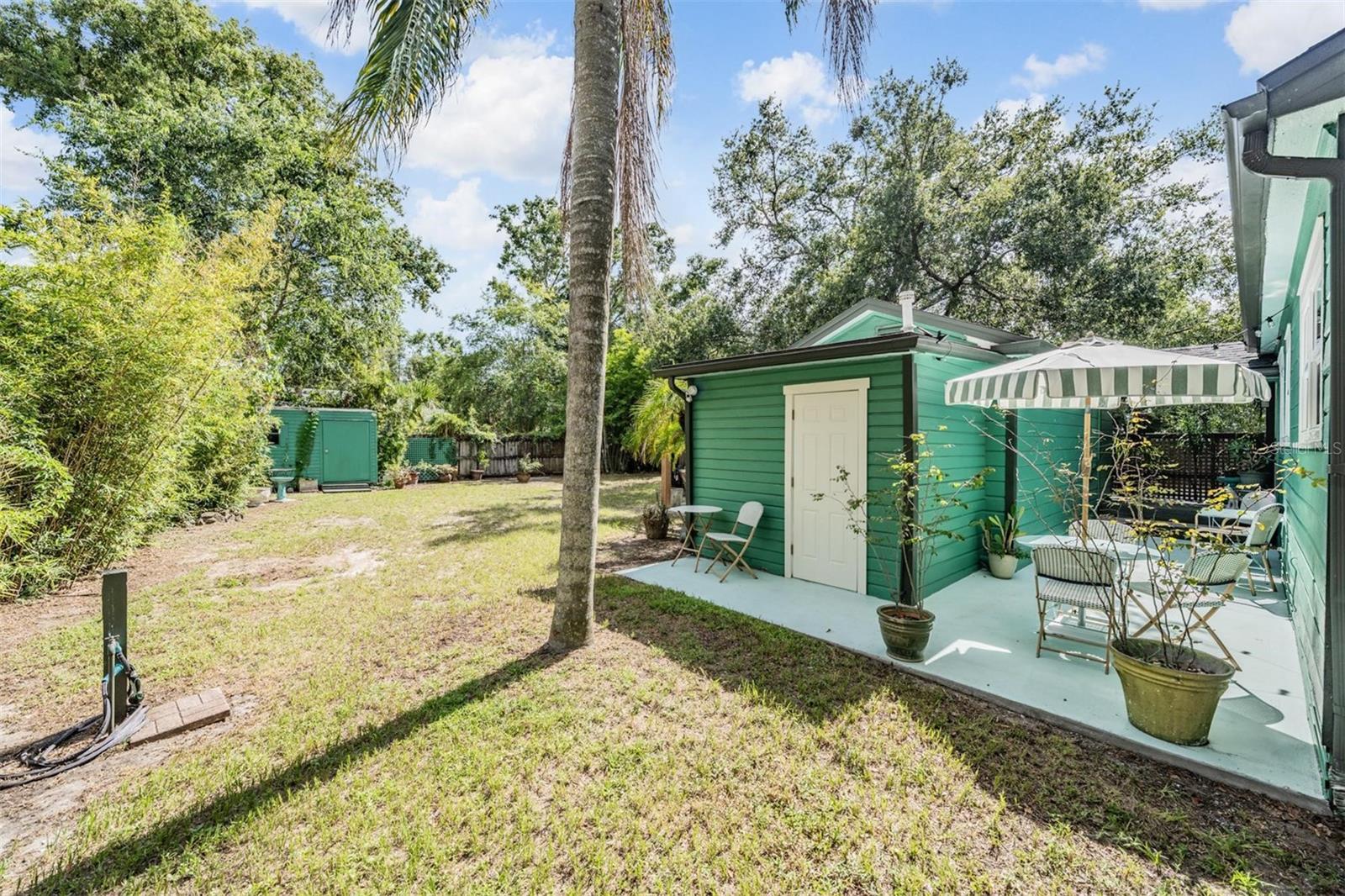 Back Patio showing large backyard storage shed on the left
