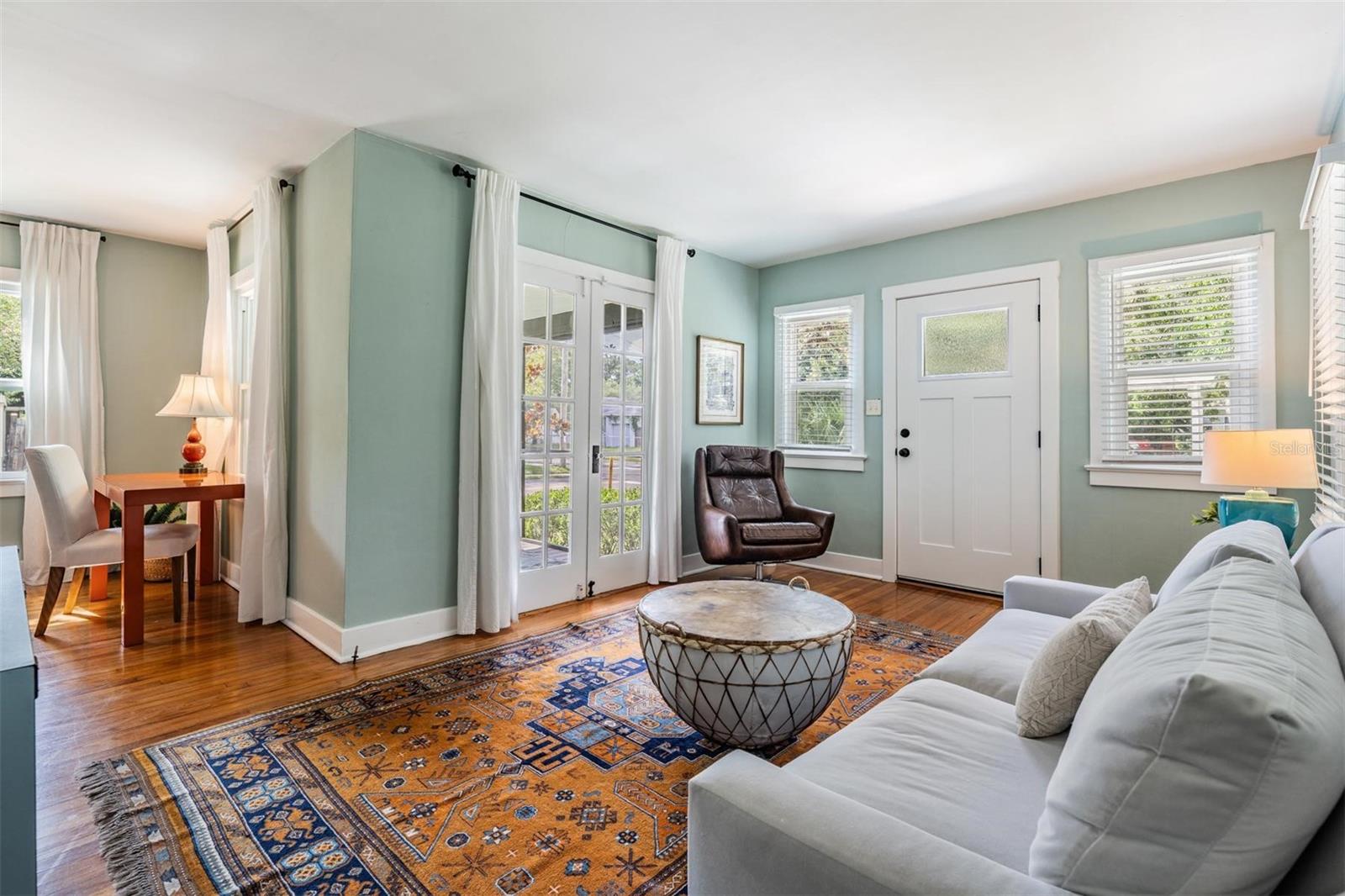 Living Room, the French doors lead to the front porch