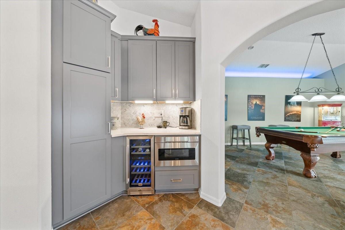 Entertaining bar with under-counter wine refrigerator
