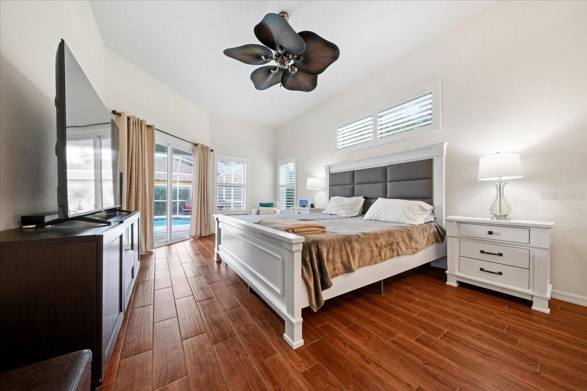 Expansive primary suite with calm, neutral finishes