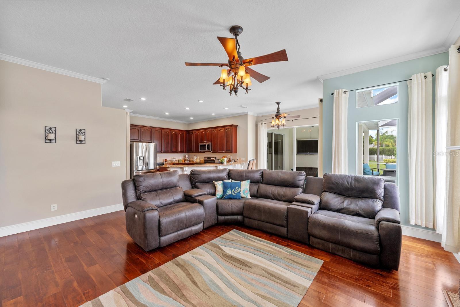 The Kitchen and Great Room are open to each other for those who like to see everything going on.  Notice the crown molding and updated baseboards.