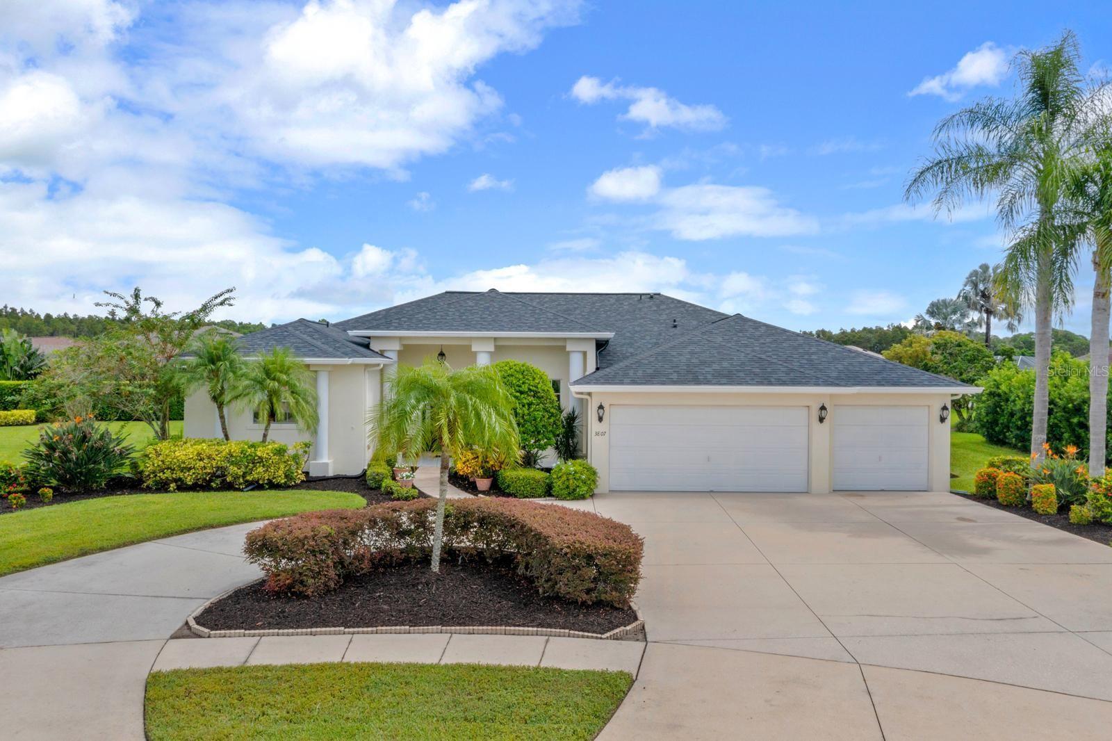 The huge driveway can accommodate 10+ cars!