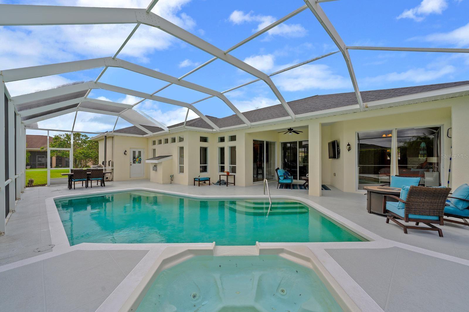 The screened-in area is a perfect size for entertaining!