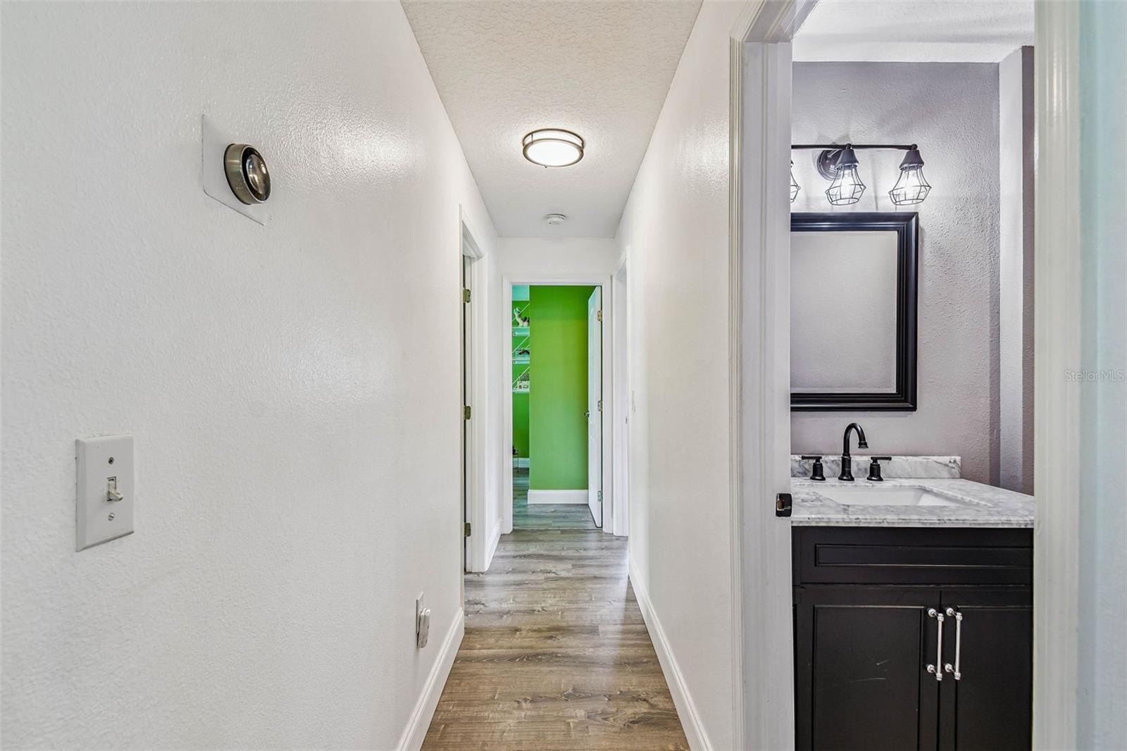 Hall to 3 additional bedrooms