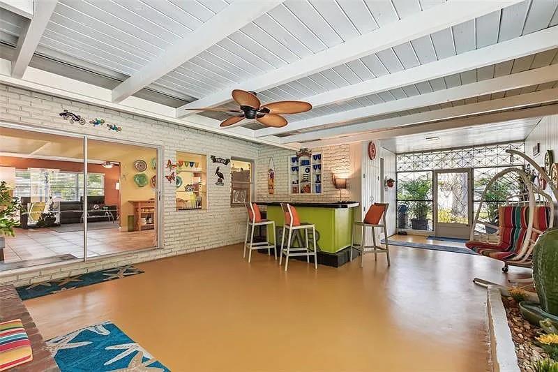 Back patio oasis with fireplace & bar