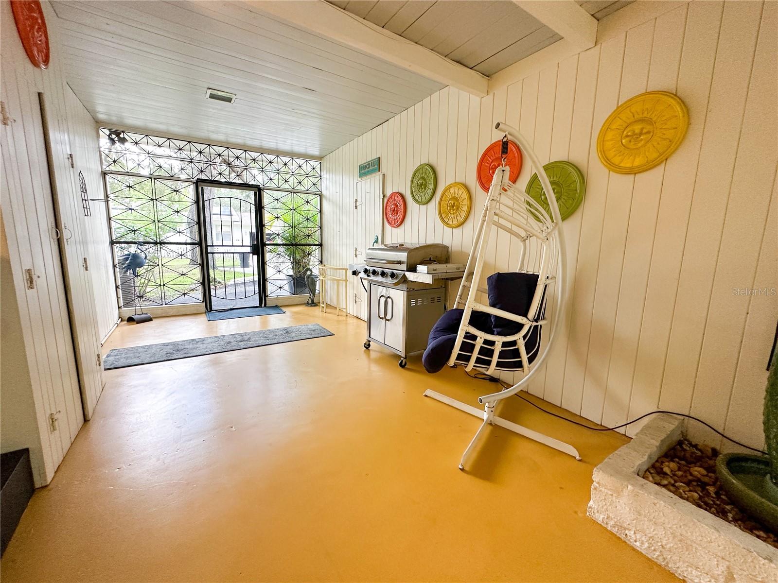 Back patio oasis with fireplace & bar