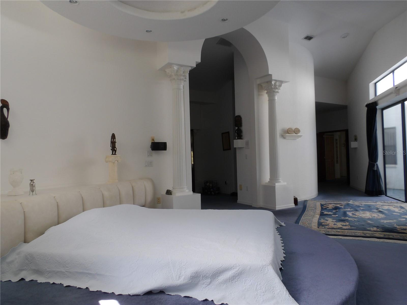 Master Suite with Grecian columns and curved walls
