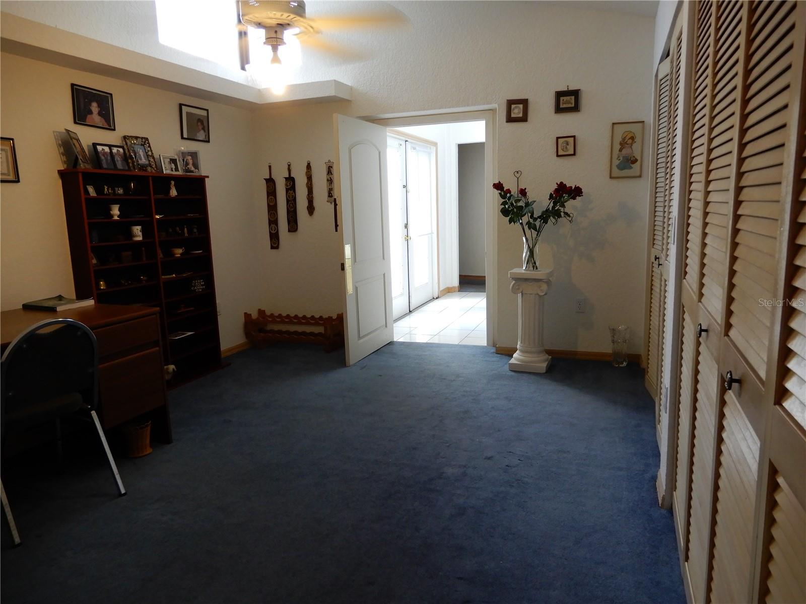Bedroom (used as office) showing entry to guest house