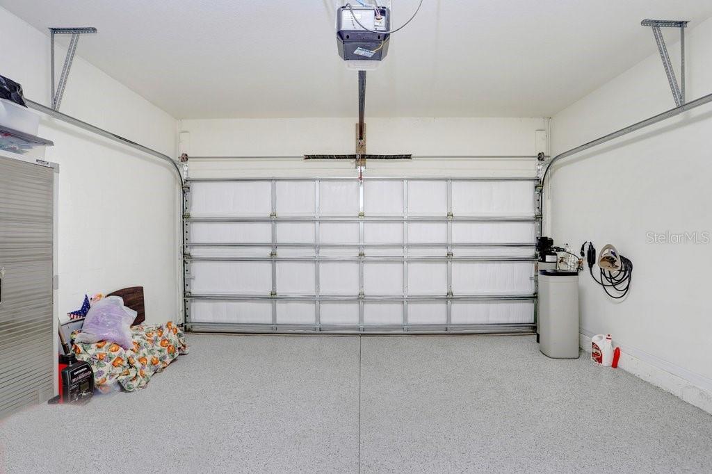 Garage with Epoxy Floor; Insulated Garage Door.