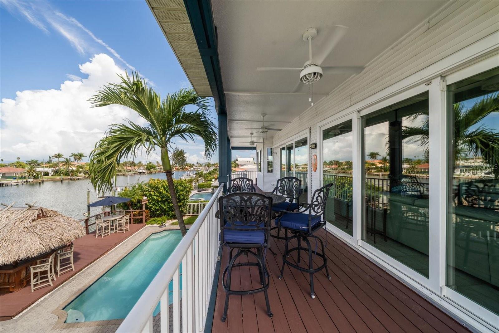 Large Patio over looking the pool and the waterfront