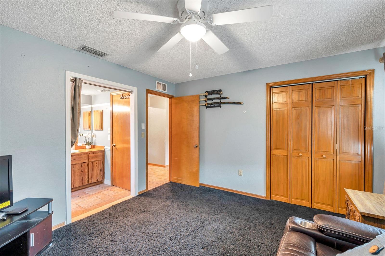 Accessible bedroom with private entrance to the hall bathroom.
