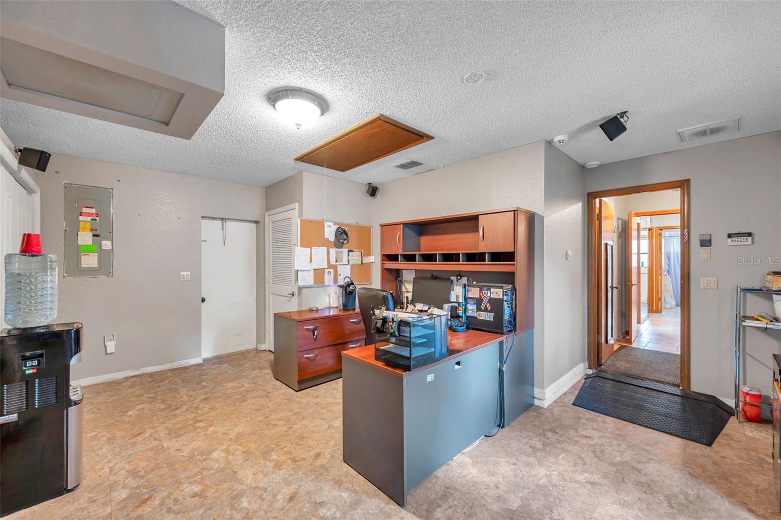 Office in converted garage, not included in Living SF. Can be turned back to a full 2 car garage