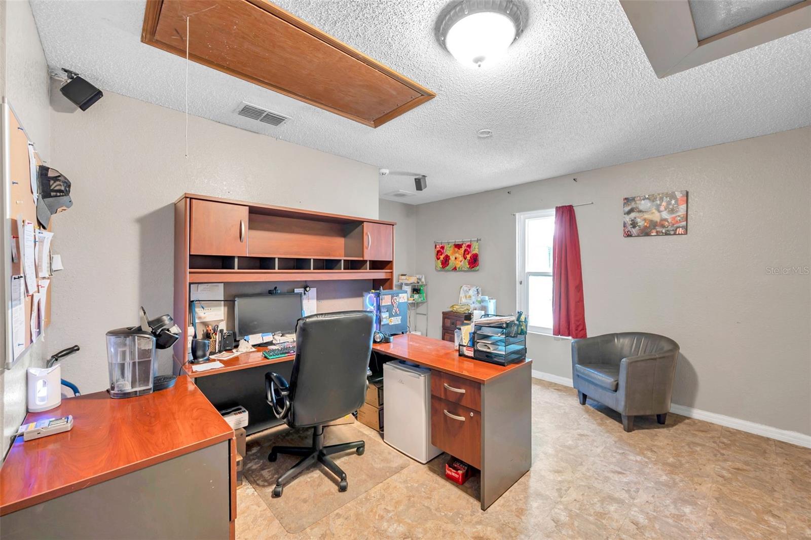 Office in converted garage, not included in Living SF. Can be turned back to a full 2 car garage