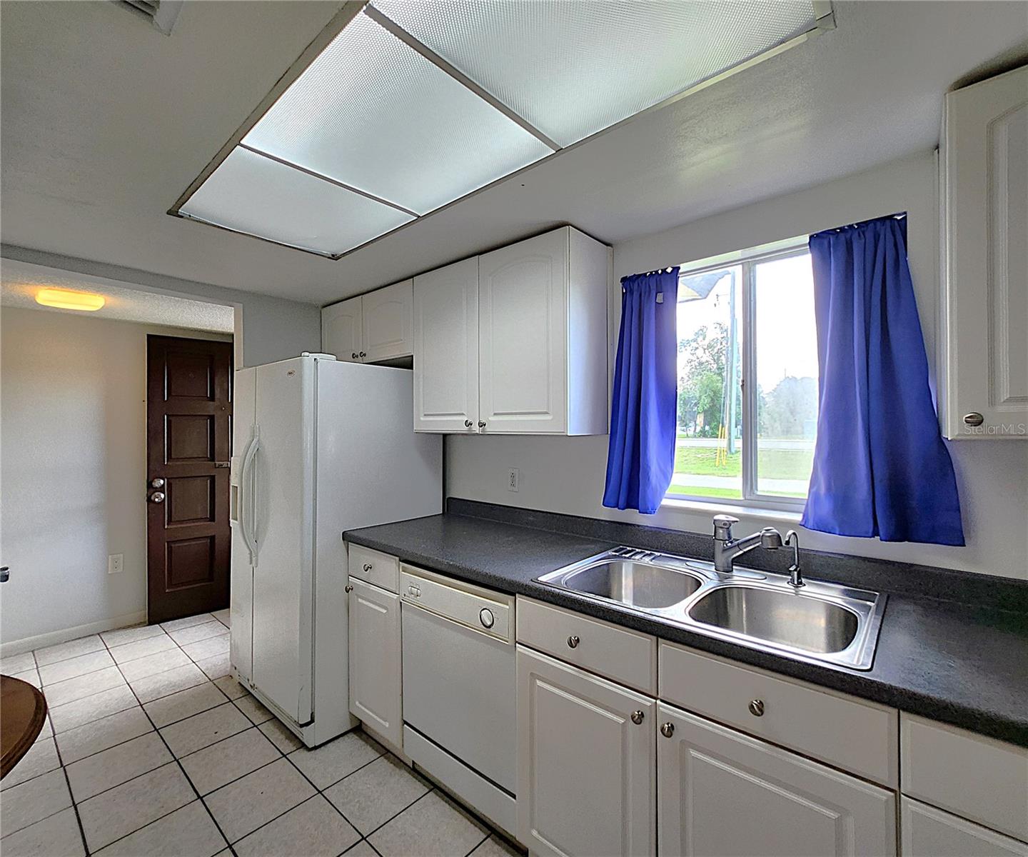 All kitchen appliances included: hooded vent, electric stove, dishwasher, refrigerator
