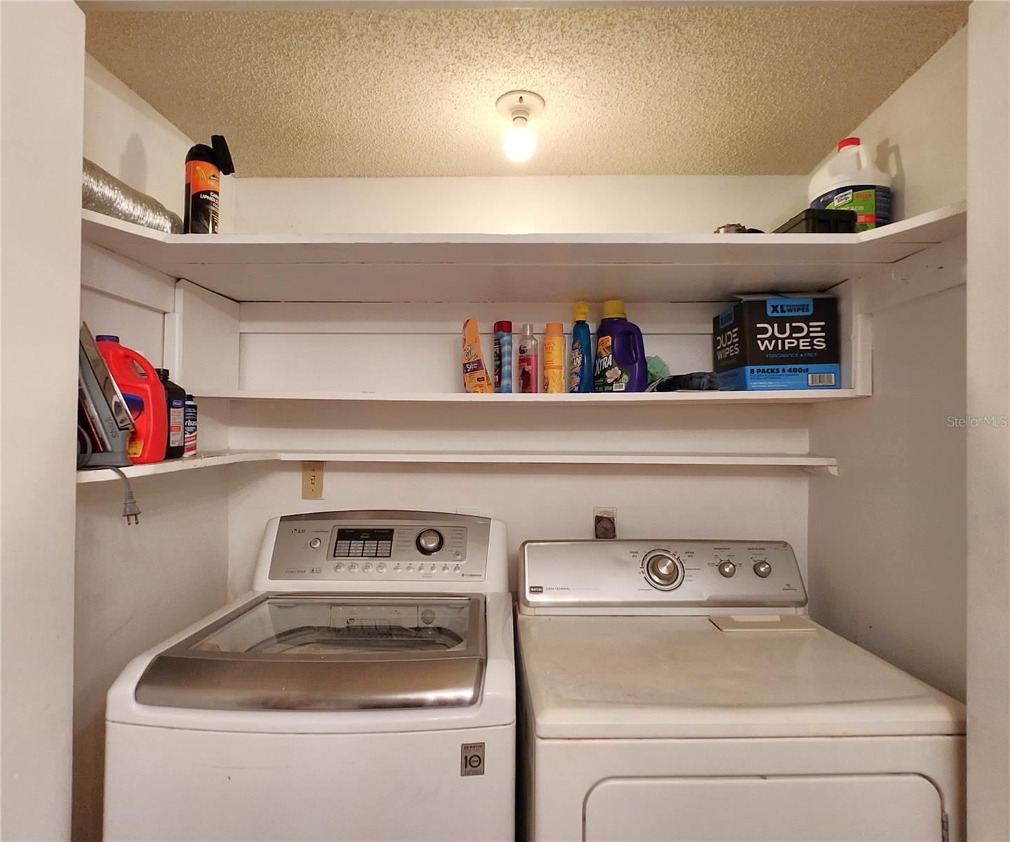 Gues Bathroom includes a Tub and Shower. Also houses the Laundry Closet w/Washer & Dryer set