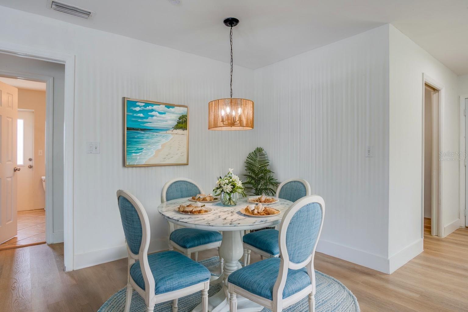 Virtually staged breakfast nook.