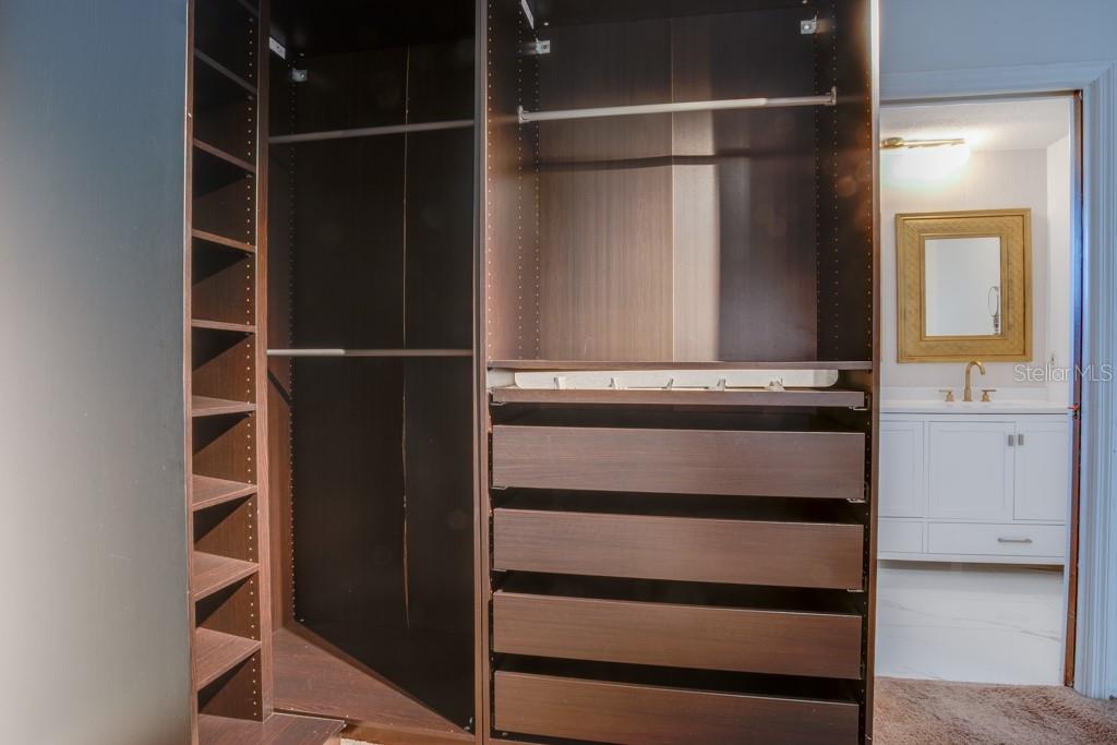 Primary walk-in closet.
