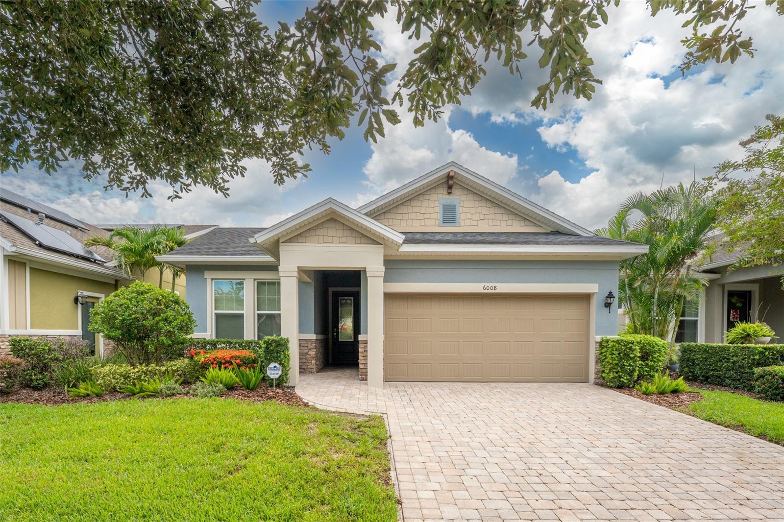 Beautiful Elevation with Pavered Driveway, Walkway & Front Porch